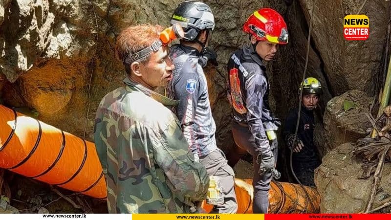 Rescuers race to free seven people trapped in flooded Laos cave