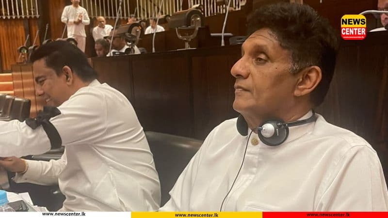 Opposition MPs protest in parliament wearing black armbands